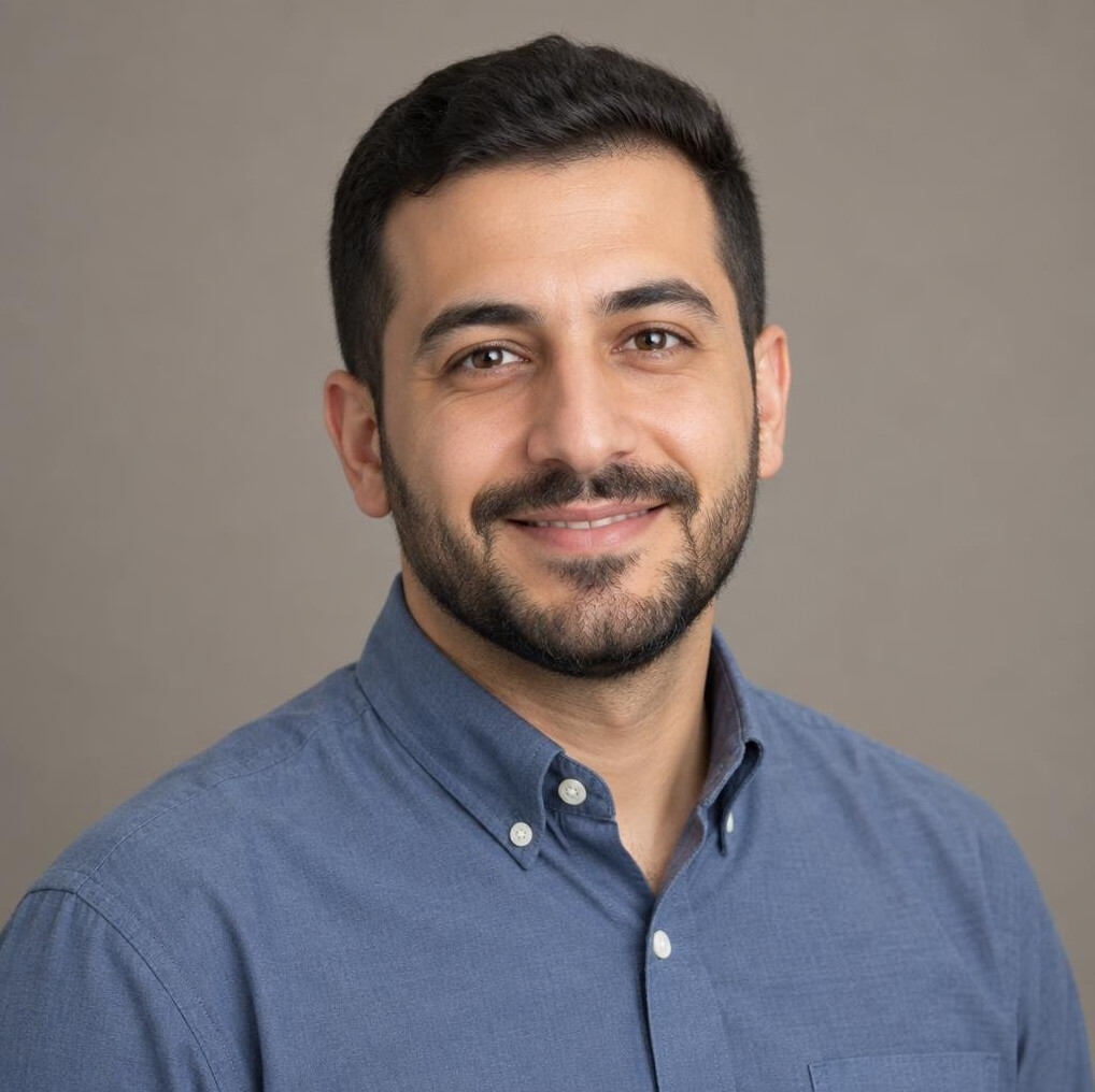 Studio portrait of a man sound and interview coordinator